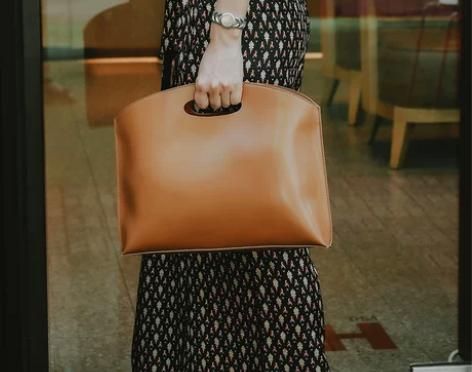 韩版新款女包手提包时尚简约手拿包大容量包信...