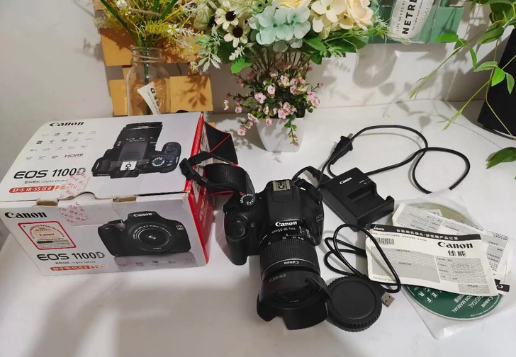 佳能1100d单反相机92新左右,无拆无修,没有暗病一切正常 佳能1100d单反相机92新左右,无拆无修,没有暗病一切正常
