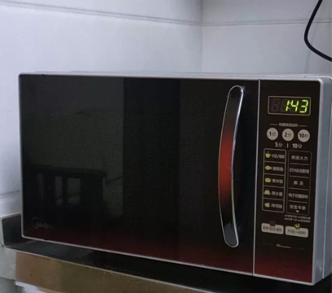微波炉美的电脑控制，无盘设计，加热均匀，正...