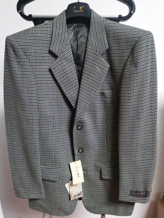 鄂尔多斯产纯羊毛西服，羊毛含量100%，全...