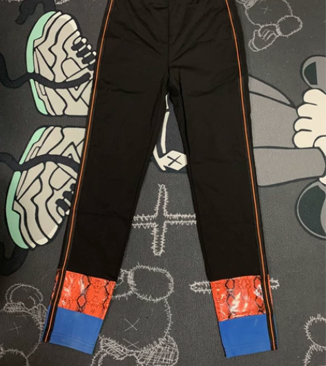 拓谷时尚个性撞色拼接休闲铅笔裤女外穿打底女...