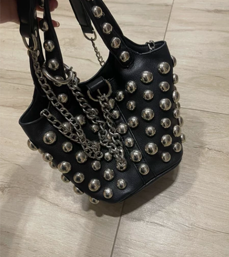 重工铆钉时尚女士手提包斜挎包 感兴趣的话点...