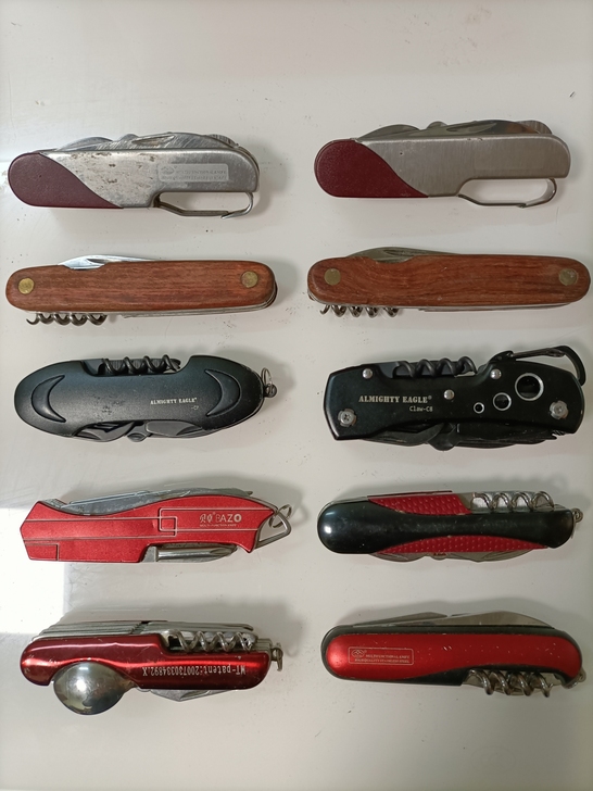 处理几把另类奇特造型瑞士多功能组合工具刀几...