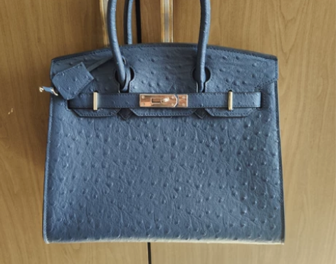 女士包包100%真皮皮革，原价五百多买的，...