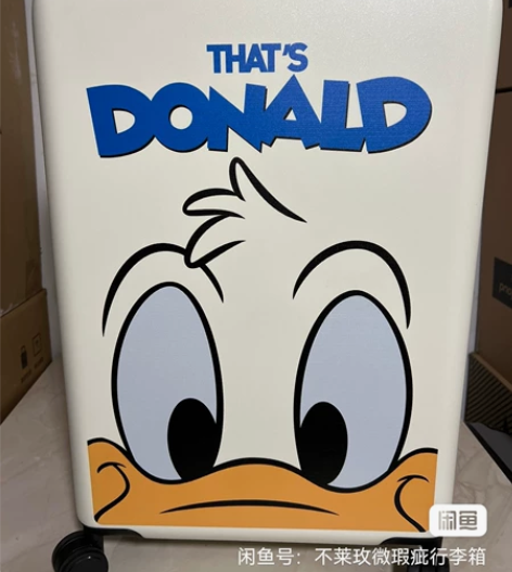 【全新】不莱玫拉杆箱旅行箱24寸唐老鸭白色...