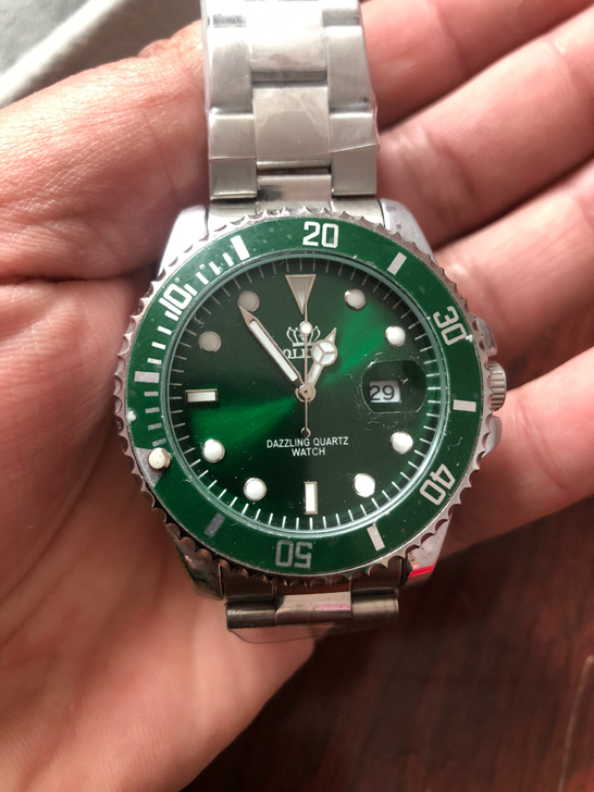 欧利时电子手表，需要换电子。样品表未撕膜