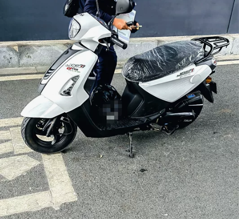 踏板摩托车125CC。基本全新车。 刚买的...