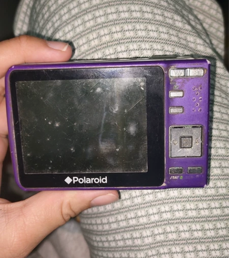 Polaroid宝丽来紫色相机。不知道是哪...