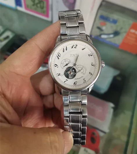 飞亚达摄影师男士全自动镂空机械表,走时准确...