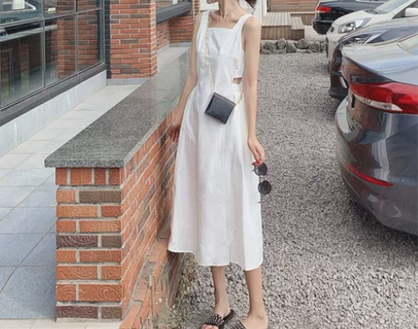 白色吊带连衣裙2020夏季法式超仙心机露背...