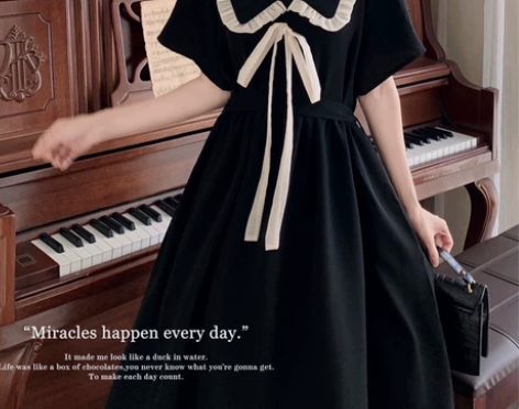 2022新款小黑裙系带娃娃领连衣裙女学院风...