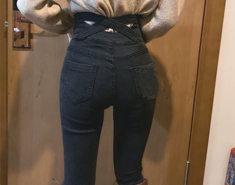 另一家高腰牛仔裤女后背交叉设计三粒扣黑色显...