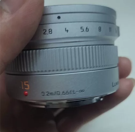松莱dg15mmf1.7,裸镜头。成色如图...