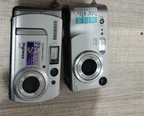 出一台惠普数码相机能通电开机屏幕坏。一台三...