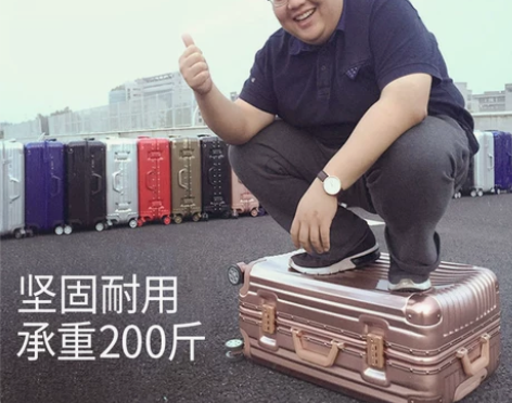 29寸行李箱，黑色，铝框塑料身，很大但是不重，非常抗摔耐造 ...