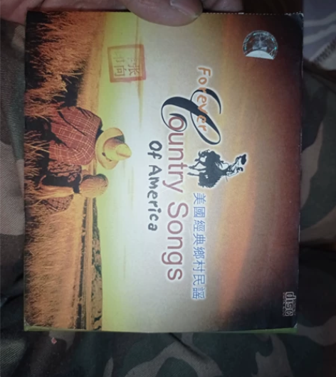 美国乡村民谣CD 这个没歌词，封皮有个人印
