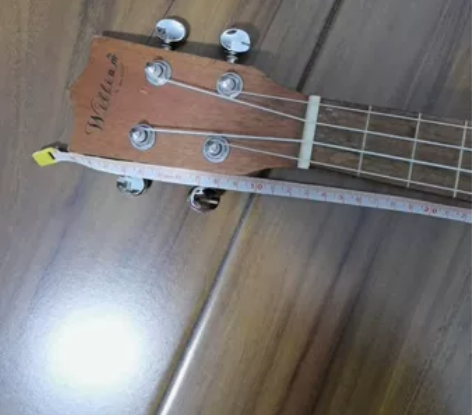 尤克里里，实木琴柄，好看买来的，不会弹啊 ...