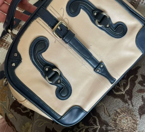 女士包斜挎包单肩包 扣子保存的还好，前面有...