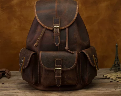 真牛皮男女通用真皮双肩包大容量多功能头层牛...