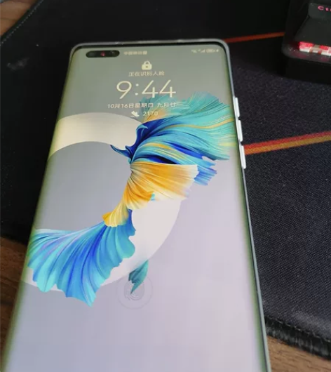 转一台华为mate40pro 5g版手机，...