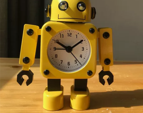 清仓价，创意机器人闹钟，闹钟响时，眼睛会亮...