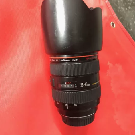 佳能镜头：28-70，8成新，最大光圈2....