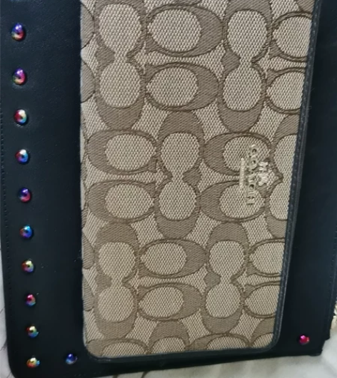 蔻弛手拿包 女士   99成新  放各种卡...