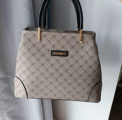 2021新款夏时尚女士手提斜挎包女高级感妈...