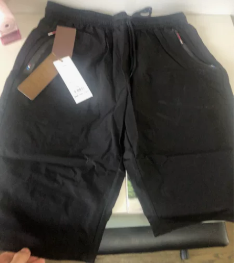 全新男士黑色短裤，裤长约58cm，腰围约100cm 感兴趣的...
