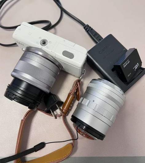 佳能EOS M100 微单，白色包含两个镜...