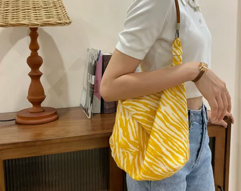 包包2021新款潮斑马纹牛皮绳单肩帆布包袋大容量休闲韩版托特...