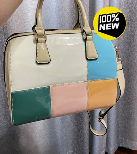 秋冬撞色斜挎手提包，大容量多内层。装得下i...