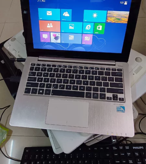 华硕笔记本s200e，笔记本正常 开机系统...