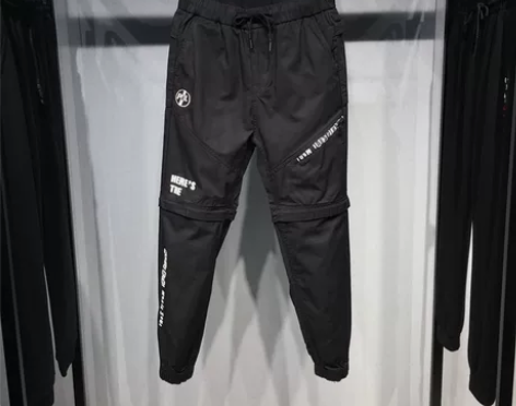 马克华菲男士休闲长裤潮流百搭黑色修身印花束...