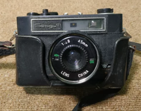 海鸥206老相机 外观旧，带半截皮套，光圈...