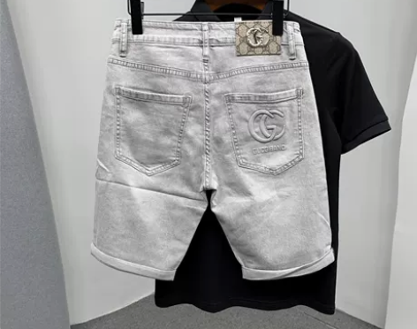 牛仔短裤 五分裤牛仔短裤欧货时尚个性金属标...