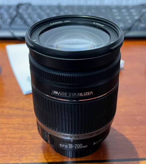 佳能 18-200 9月份的镜头买来用过两...