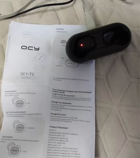 qcyt1耳机，带着充电仓和说明书 左耳掉...