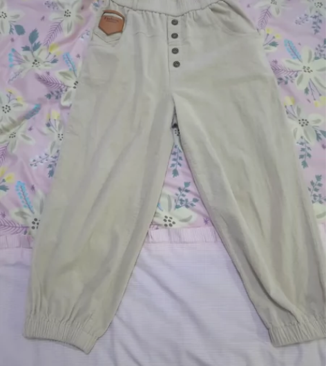 米色休闲裤,裤长89厘米,裤腰2尺3,松紧...