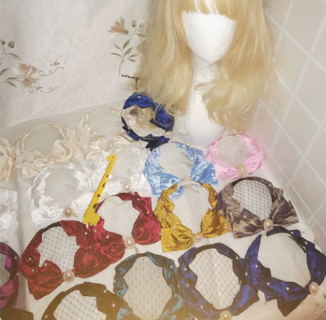 35一个镂空小礼帽 批发价格清，35一个包...