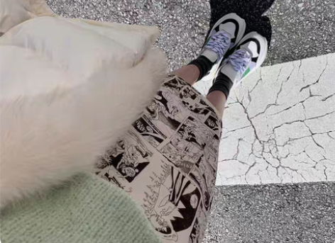 FBB李明萱2019秋冬新款气质印花漫画半裙简约显瘦后开叉裙...