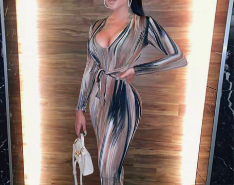 转卖欧洲站流行女装时尚涂鸦印花长袖低胸深V...