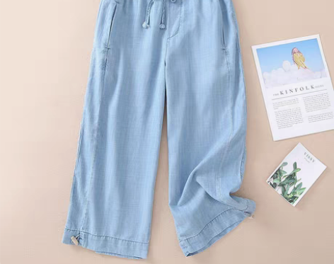 转卖2021夏韩版裤脚木扣收口天丝牛仔裤女...