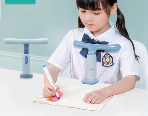 包邮猫太子坐姿矫正器支架桌垫小学生用儿童学...