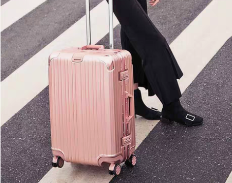 转卖游乐者拉杆箱行李箱铝框旅行箱万向轮20...