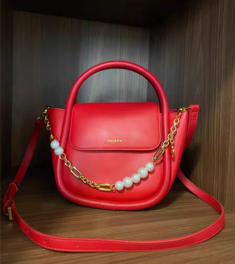 转卖【商场同款】纽芝兰红色包包新款真皮妈妈...