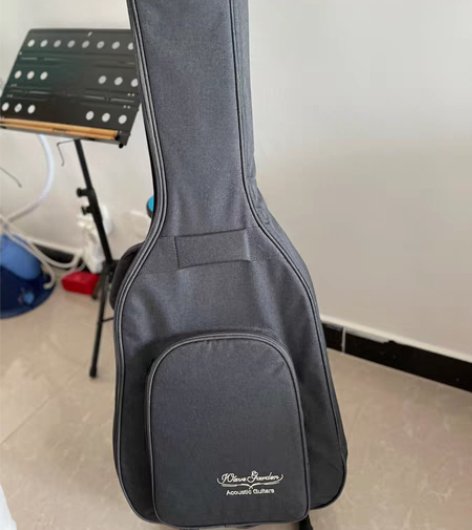 全新吉他包,可装40寸吉他,有护颈,袋子有...