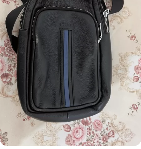 实拍，红谷品牌男士真皮包，可单肩，可斜挎。...