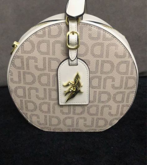 圆饼包 这个能放下6.5寸屏手机   长2...