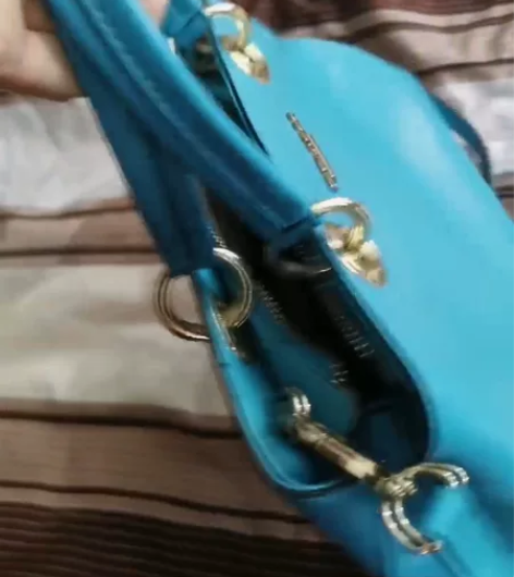 稻草人品牌女包、简约优雅手提包。 精选材质...